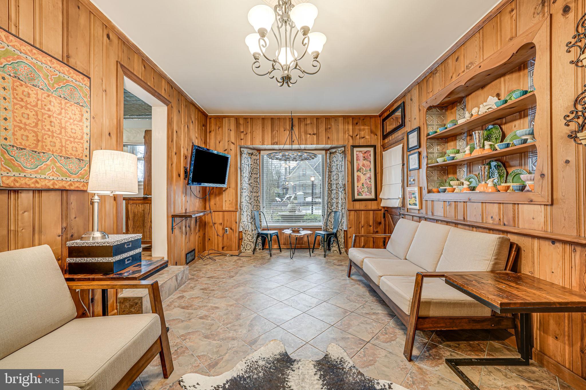 8536 Aponi Road Vienna, VA 22180 - Photo 15 of 40 a living room with furniture and a large window