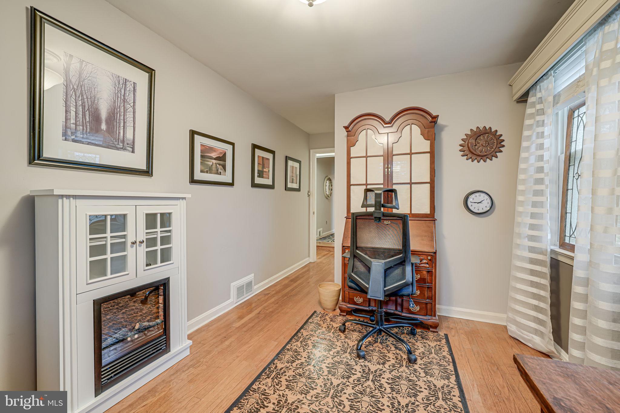 8536 Aponi Road Vienna, VA 22180 - Photo 25 of 40 a view of a livingroom with furniture and front door