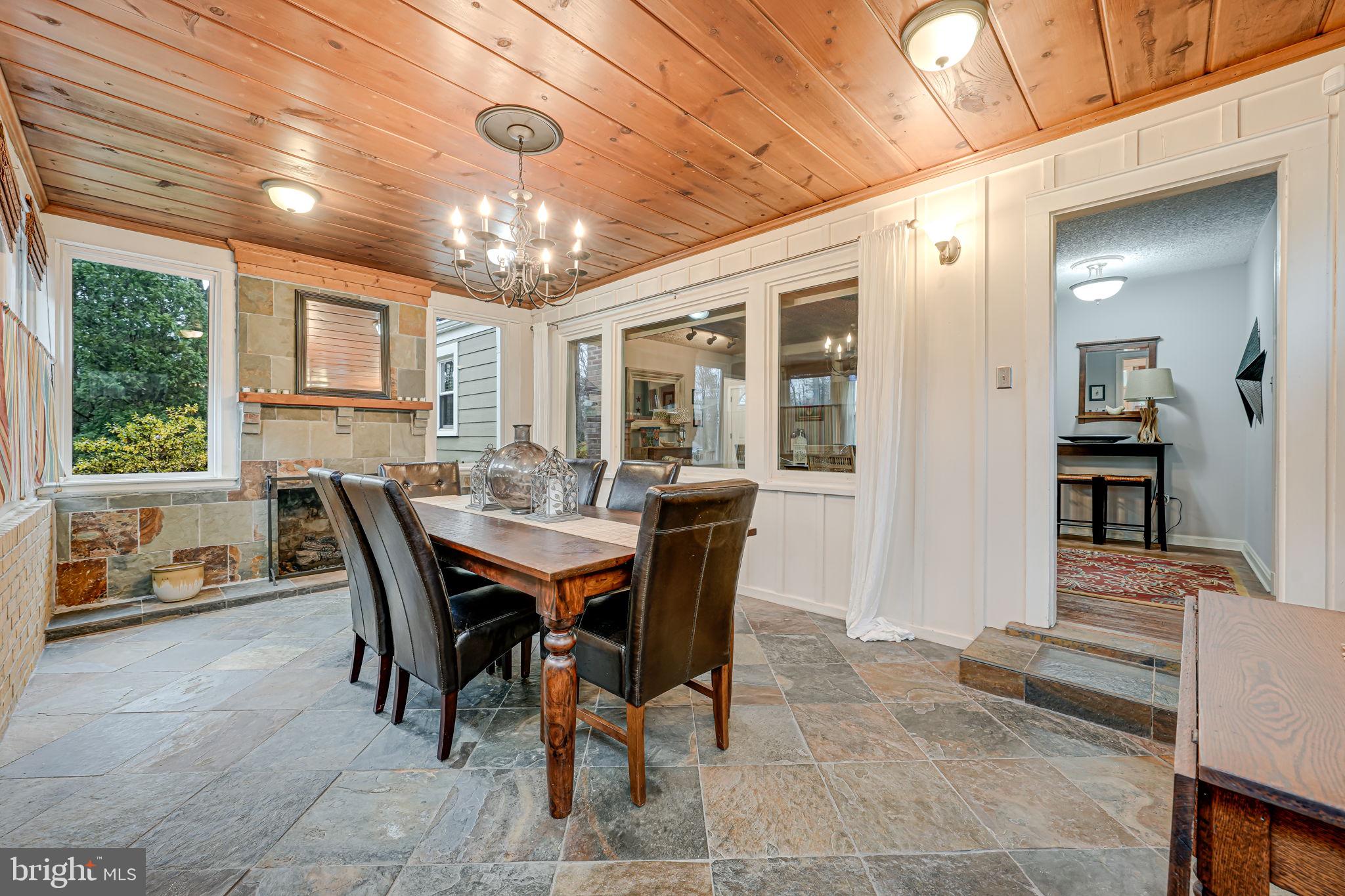 8536 Aponi Road Vienna, VA 22180 - Photo 8 of 40 a view of a dining room with furniture window and outside view