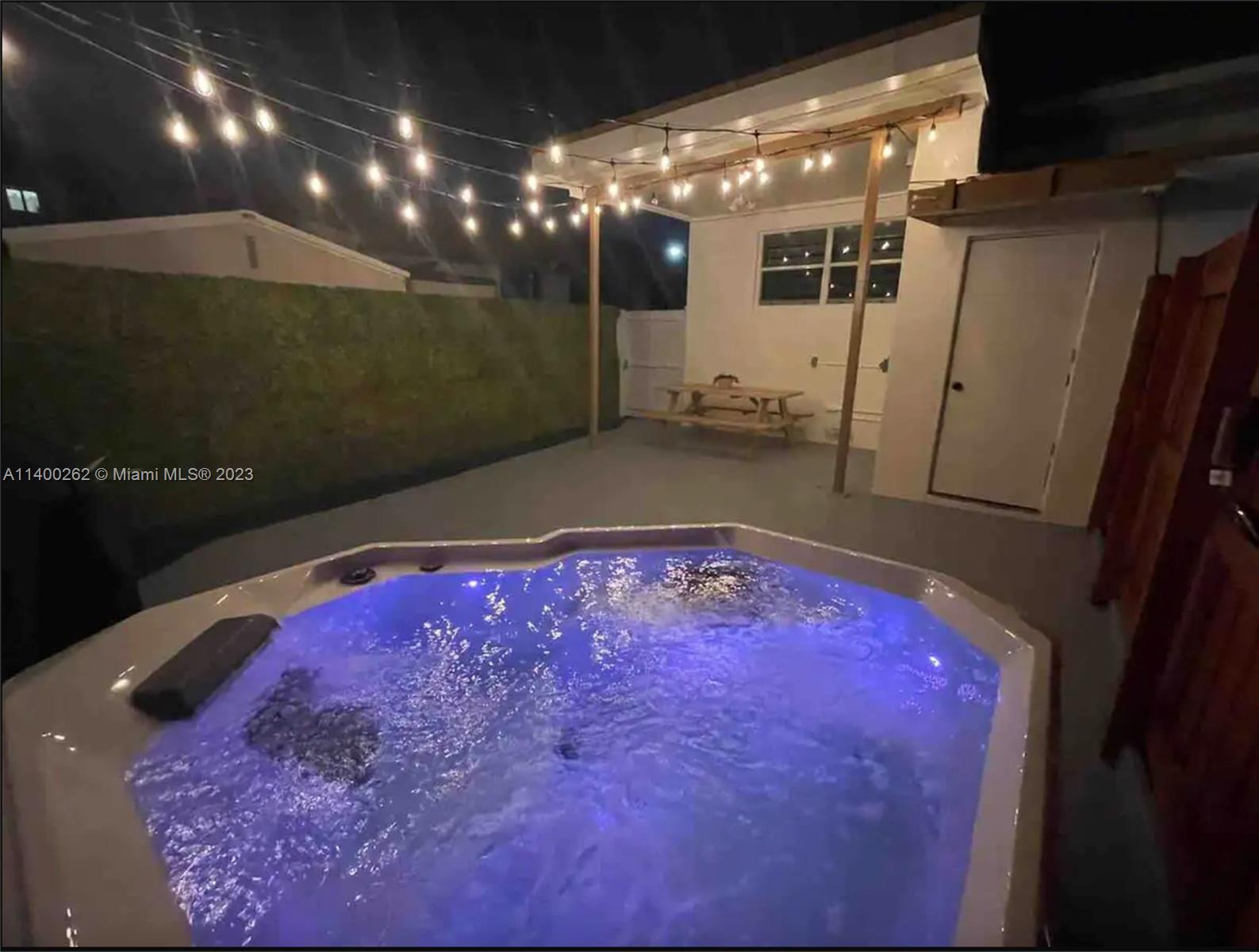 1232 Southwest 30th Place Miami, FL 33135 - Photo 2 of 7 a bathroom with a bathtub and shower