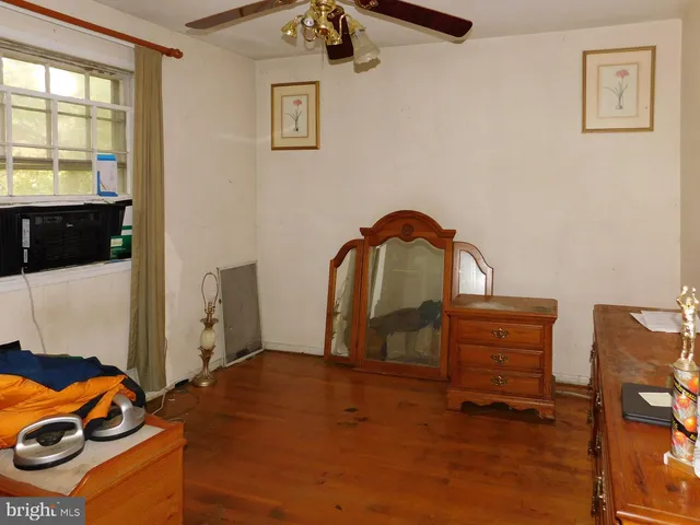 a room with furniture and a window