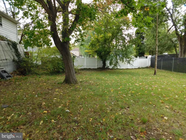 a backyard of a house with seating space
