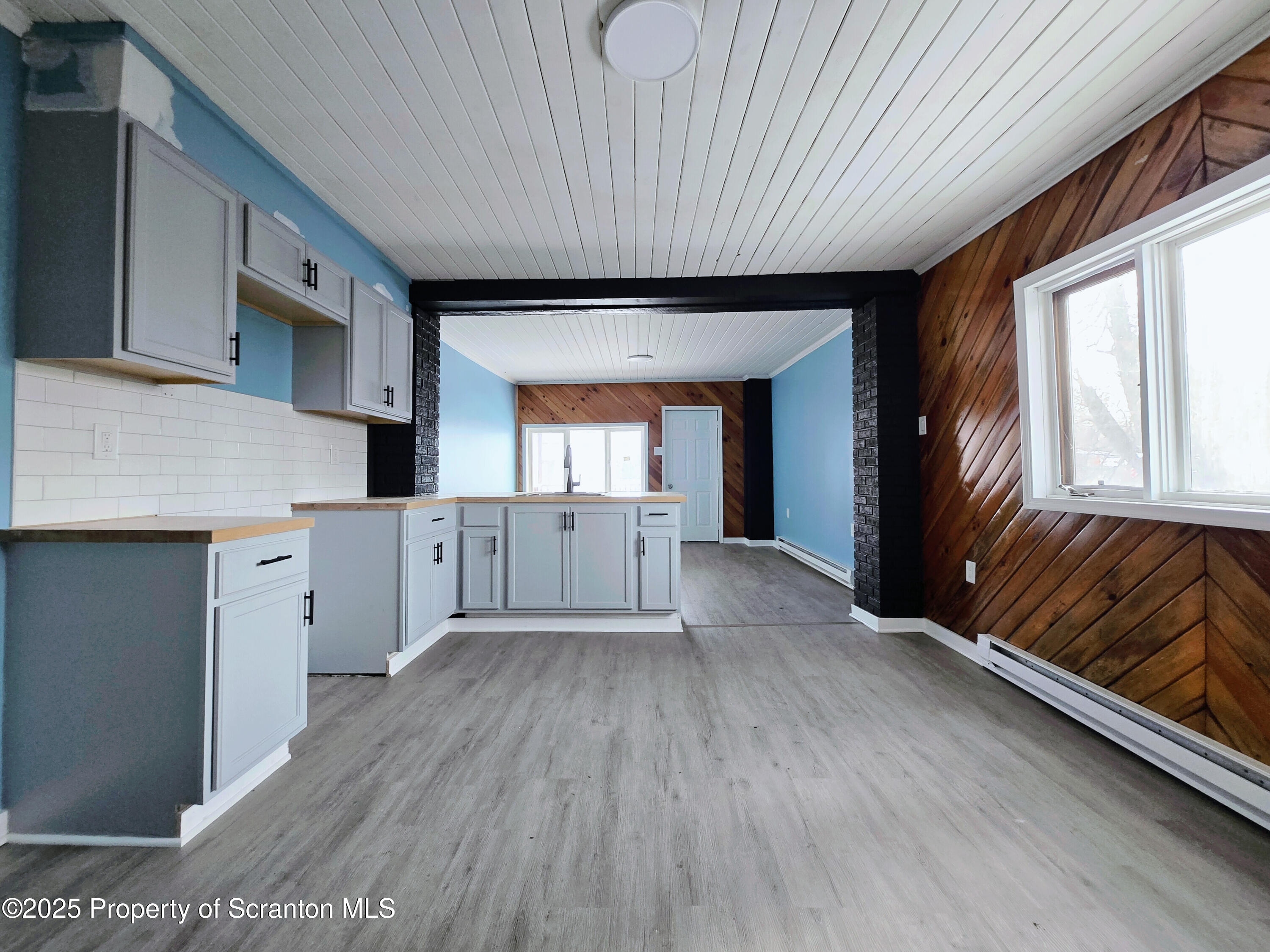 1513 Meylert Avenue Scranton, PA 18509 - Photo 12 of 27 a view of a kitchen with furniture and a window