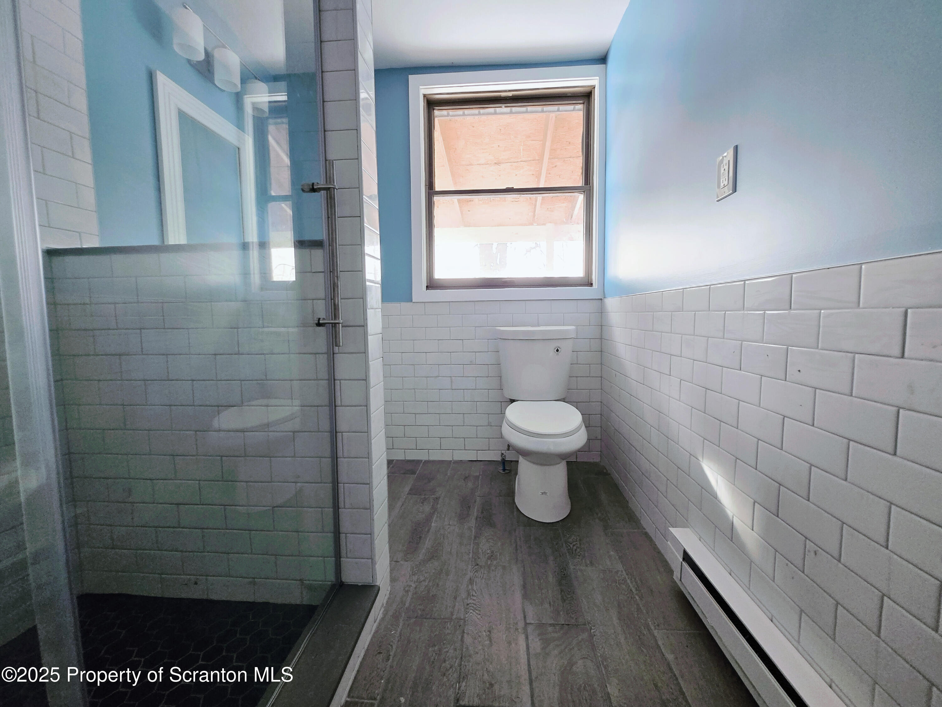 1513 Meylert Avenue Scranton, PA 18509 - Photo 13 of 27 a bathroom with a sink and a toilet