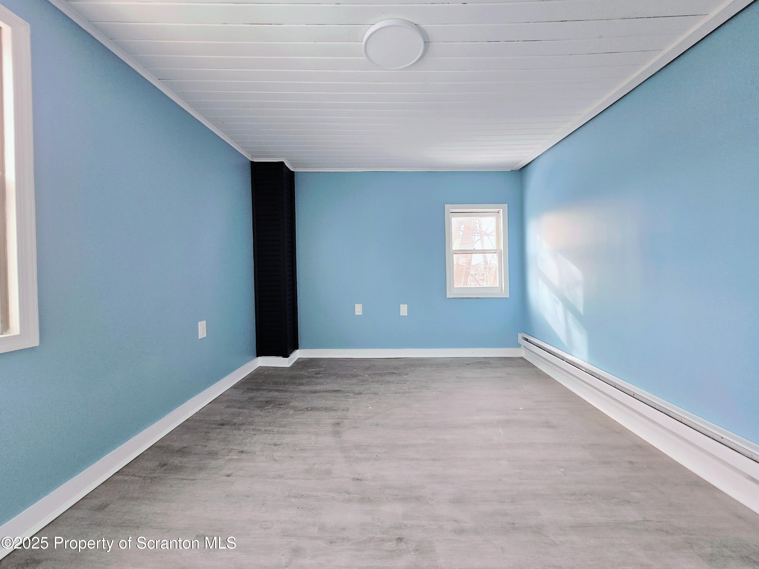 1513 Meylert Avenue Scranton, PA 18509 - Photo 20 of 27 an empty room with windows and closet