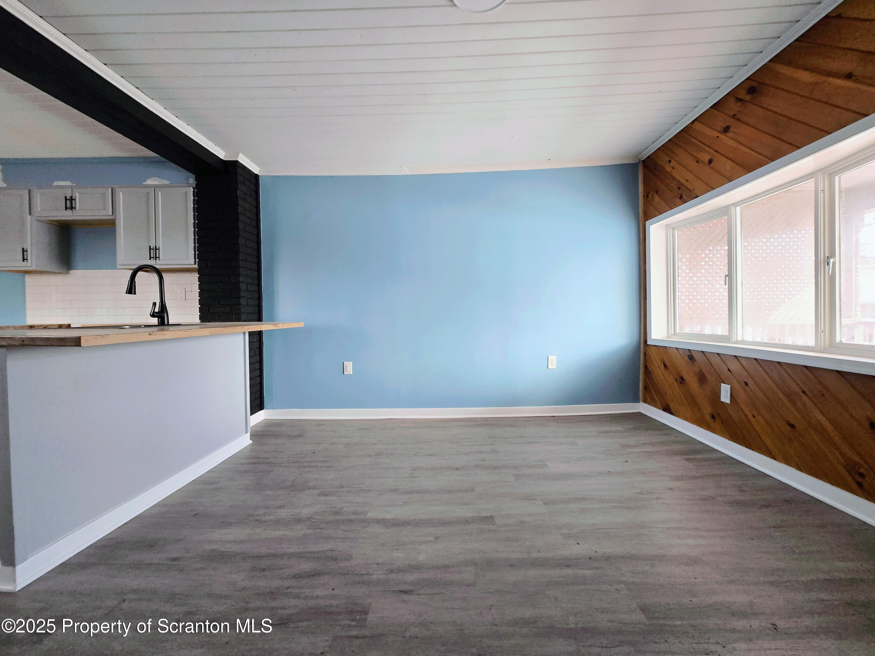 1513 Meylert Avenue Scranton, PA 18509 - Photo 7 of 27 a view of a kitchen with a sink and a window