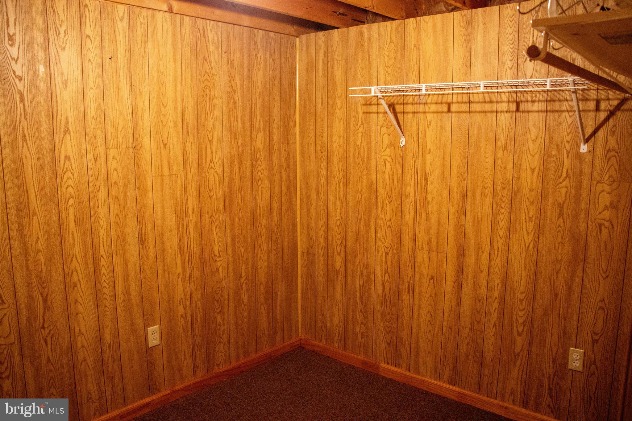 387 West Ridge Loop Road Romney, WV 26757 - Photo 55 of 58 Bottom Basement- Section 2 (storage room w/ door)