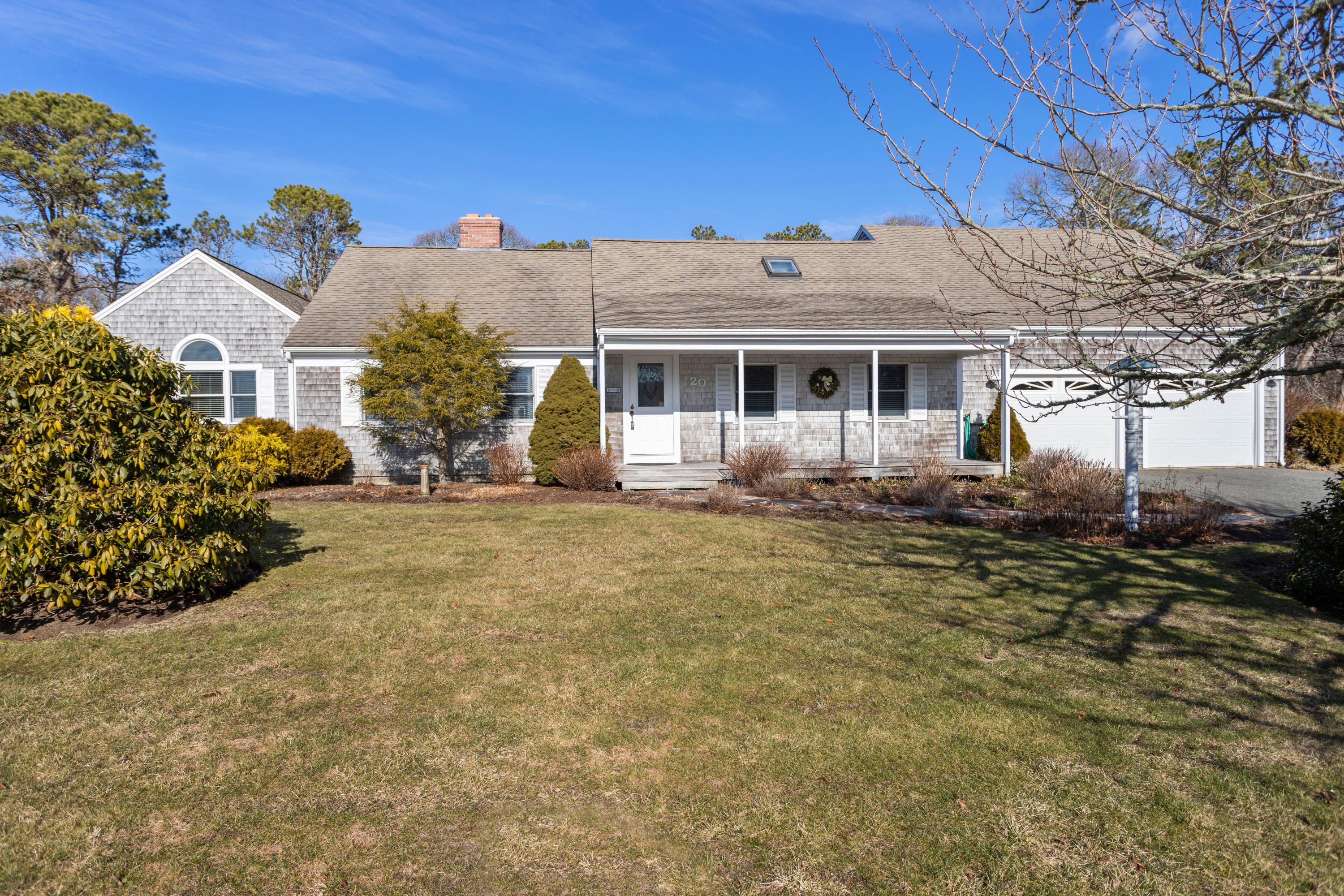 20 Long Road Harwich, MA 02645 - Photo 3 of 40 front view of a house with a yard