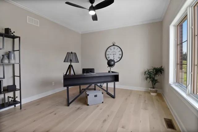 a kitchen with kitchen island granite countertop a sink stainless steel appliances and cabinets