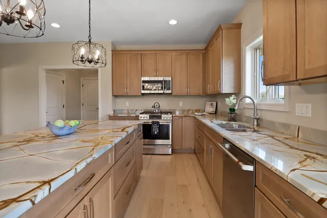 a view of a hallway with stairs