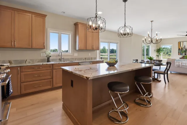 a bedroom with bed and window