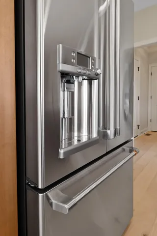 a bathroom with double vanity sink a vanity and mirrors