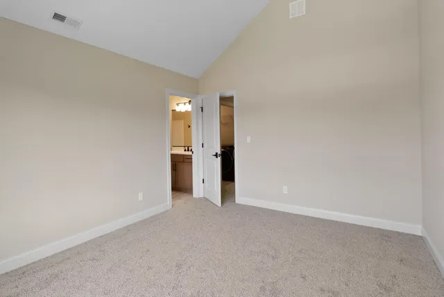 a aerial view of a house with a ocean view