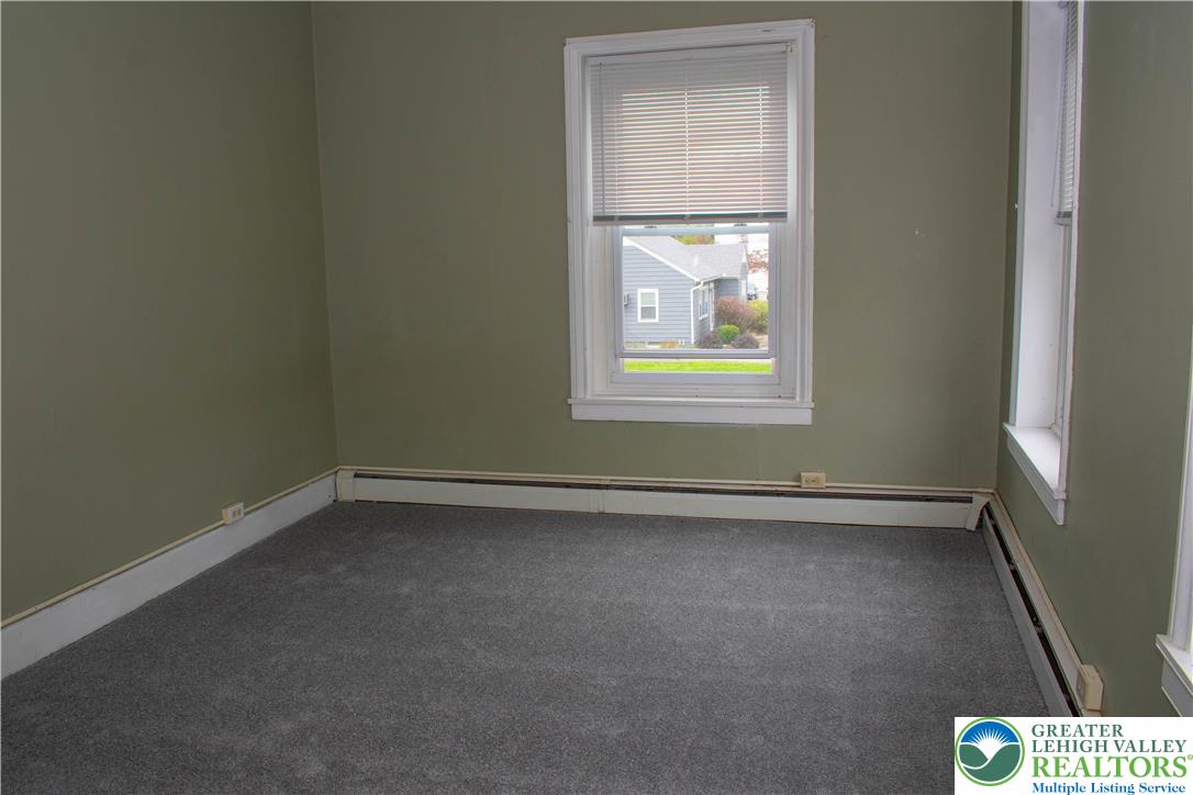 3914 Mauch Chunk Road Coplay, PA 18037 - Photo 6 of 8 an empty room with a window