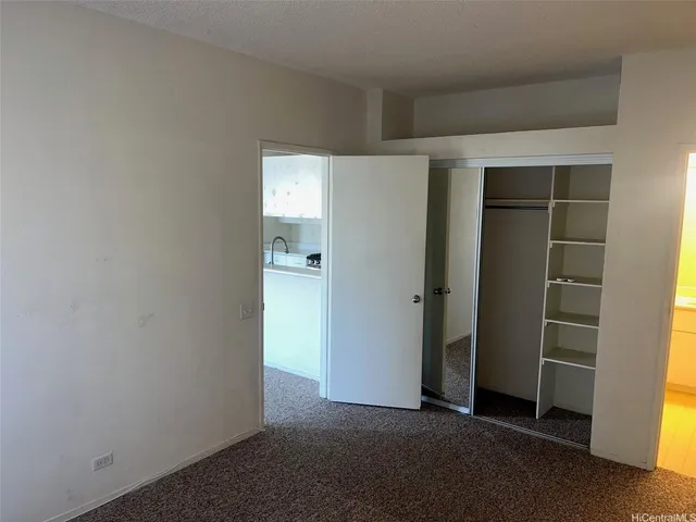 an empty room with closet
