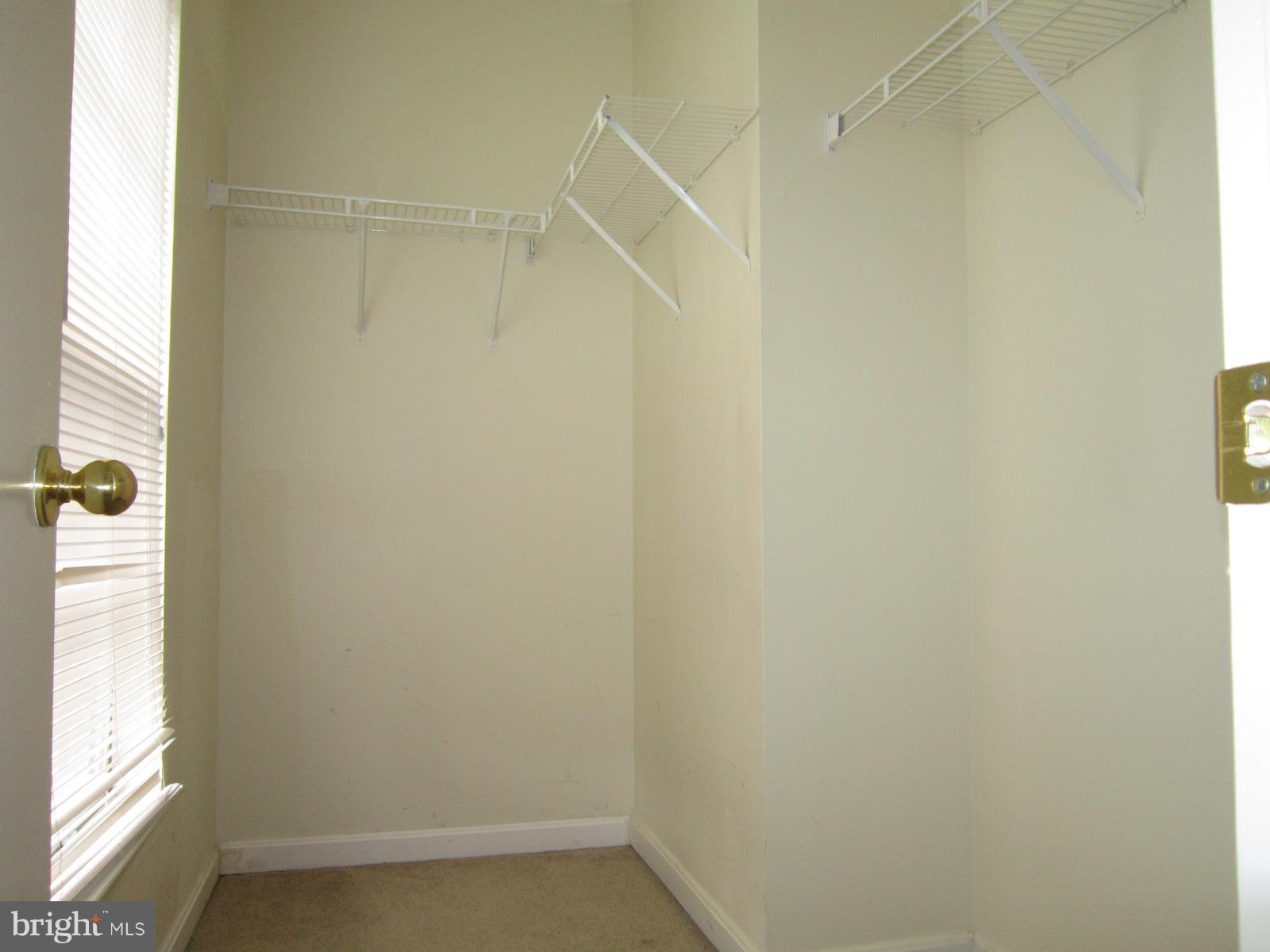 13972 Lullaby Road, Unit 4 Germantown, MD 20874 - Photo 12 of 18 Owner Bedroom Walk-In Closet