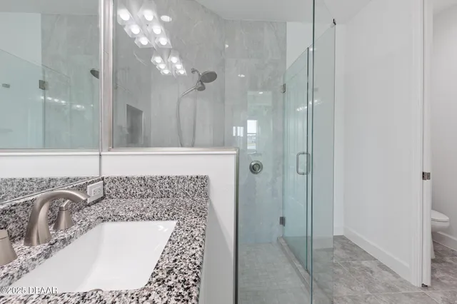 a view of a house with a garden