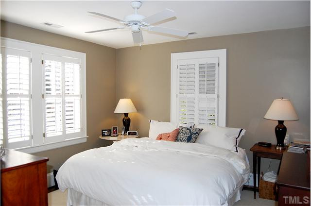 118 Hudson Street Raleigh, NC 27608 - Photo 9 of 12 Master bedroom with lots of windows, walkin cedar closet and ceiling fan. Master Bedroom