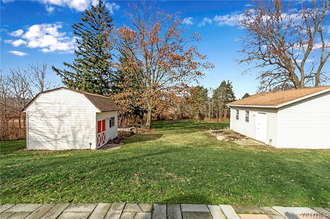 7140 Bear Ridge Road Pendleton, NY 14120 - Photo 41 of 44 Utility Shed (Left) & Large Workshop (Right)
