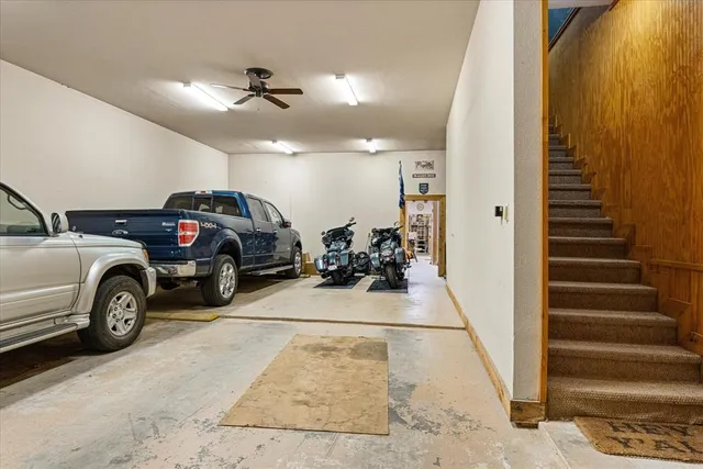 a view of a big house with garden