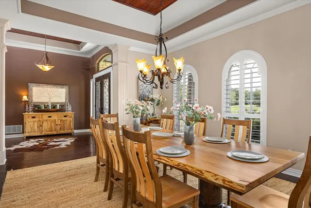 a view of entryway with wooden floor