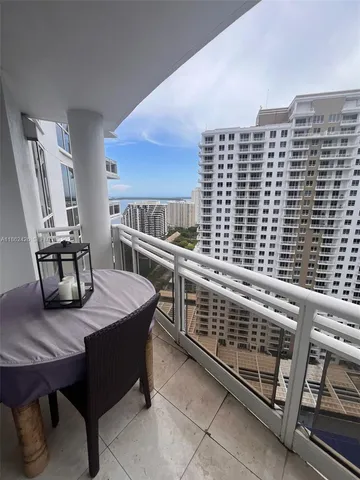 a kitchen with a table and chairs