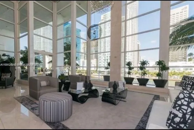 a view of a swimming pool and a patio