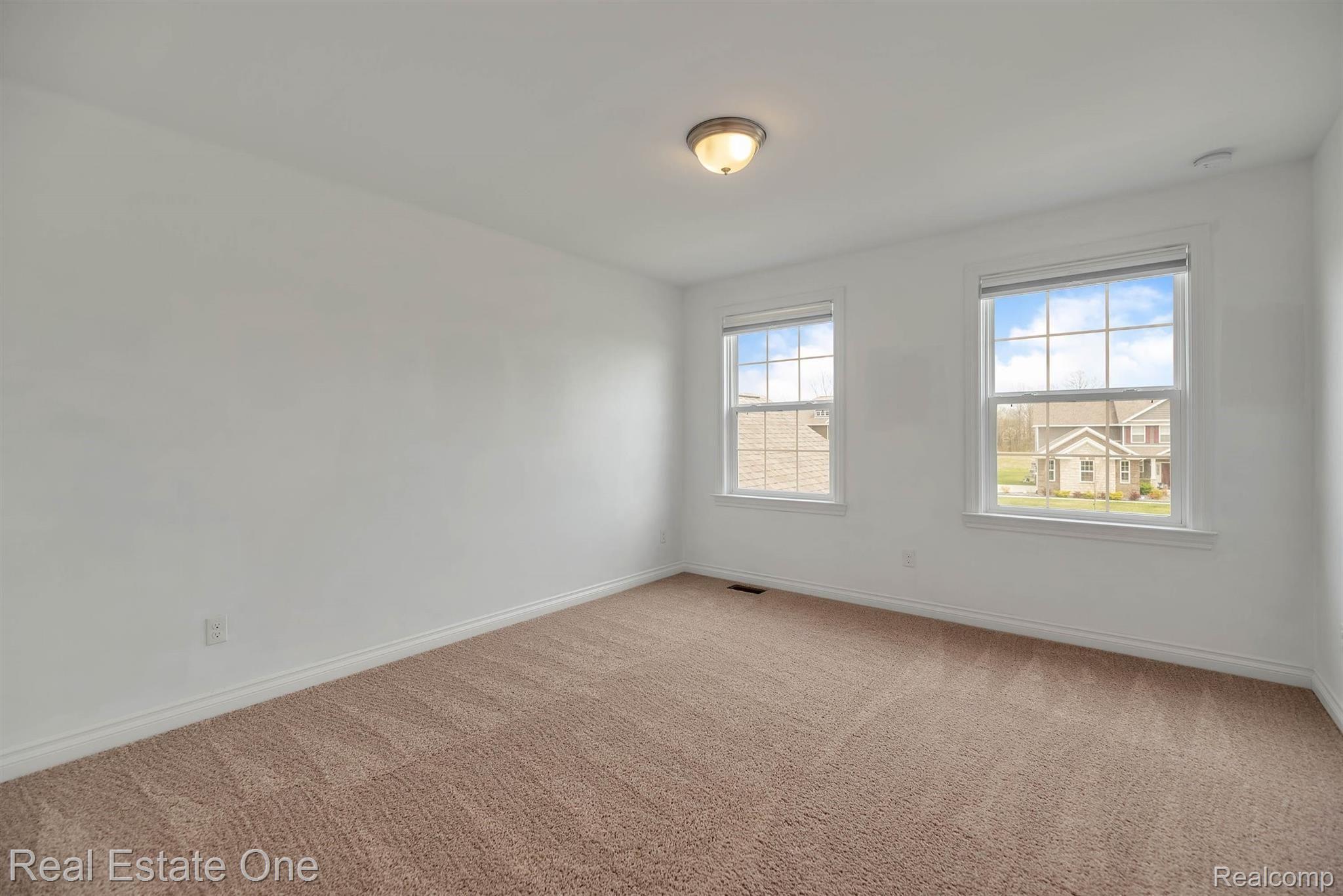 2452 Walnut View Drive Howell, MI 48855 - Photo 23 of 39 28-2452 Walnut View Dr-WindowStill-Real-Estate-Photography-28.jpg