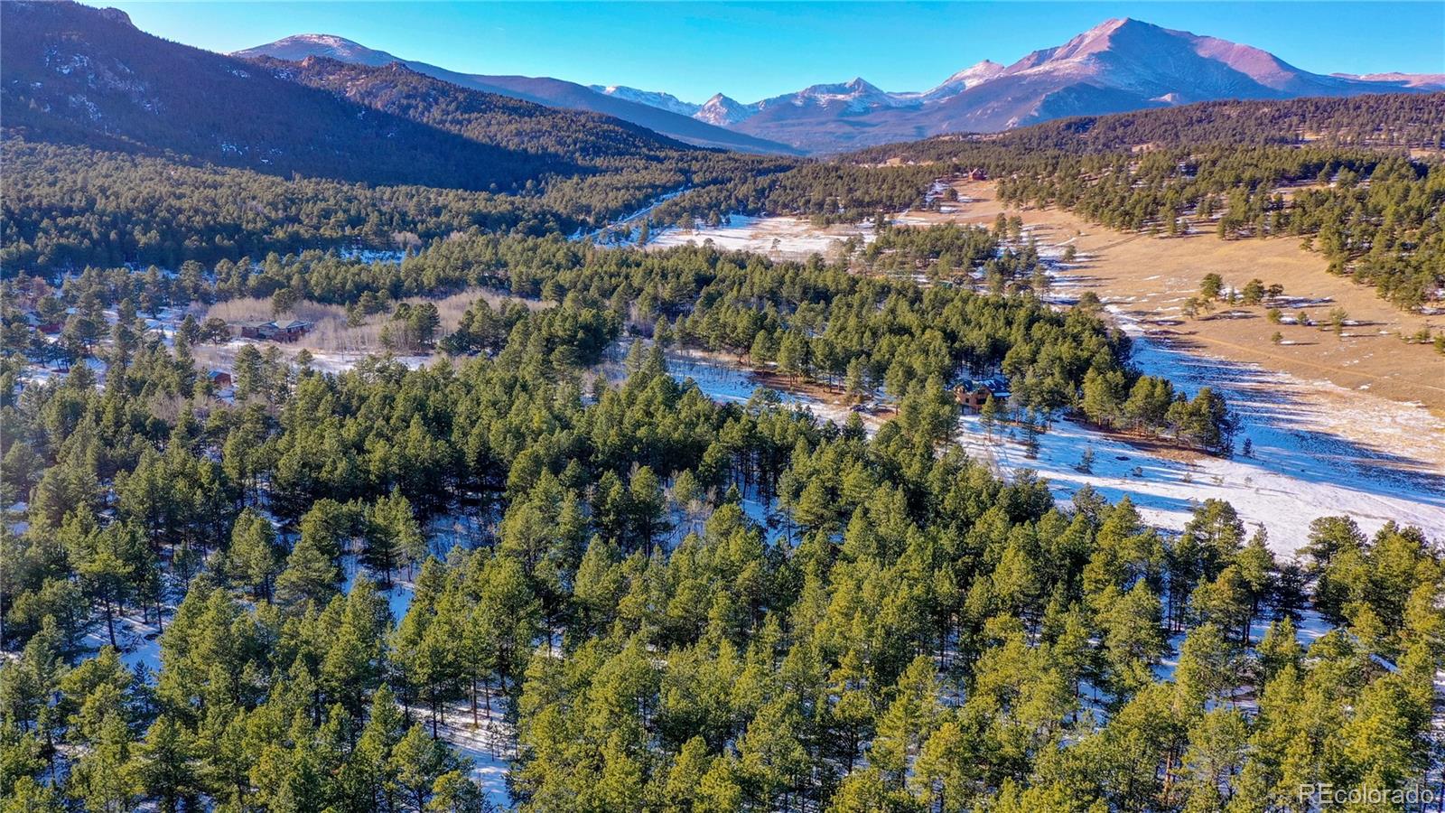 357 Big John Road Lyons, CO 80540 - Photo 17 of 17 a view of a houses with a yard