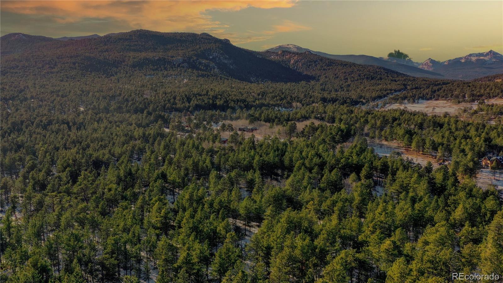 357 Big John Road Lyons, CO 80540 - Photo 3 of 17 a view of a and mountain in the distance