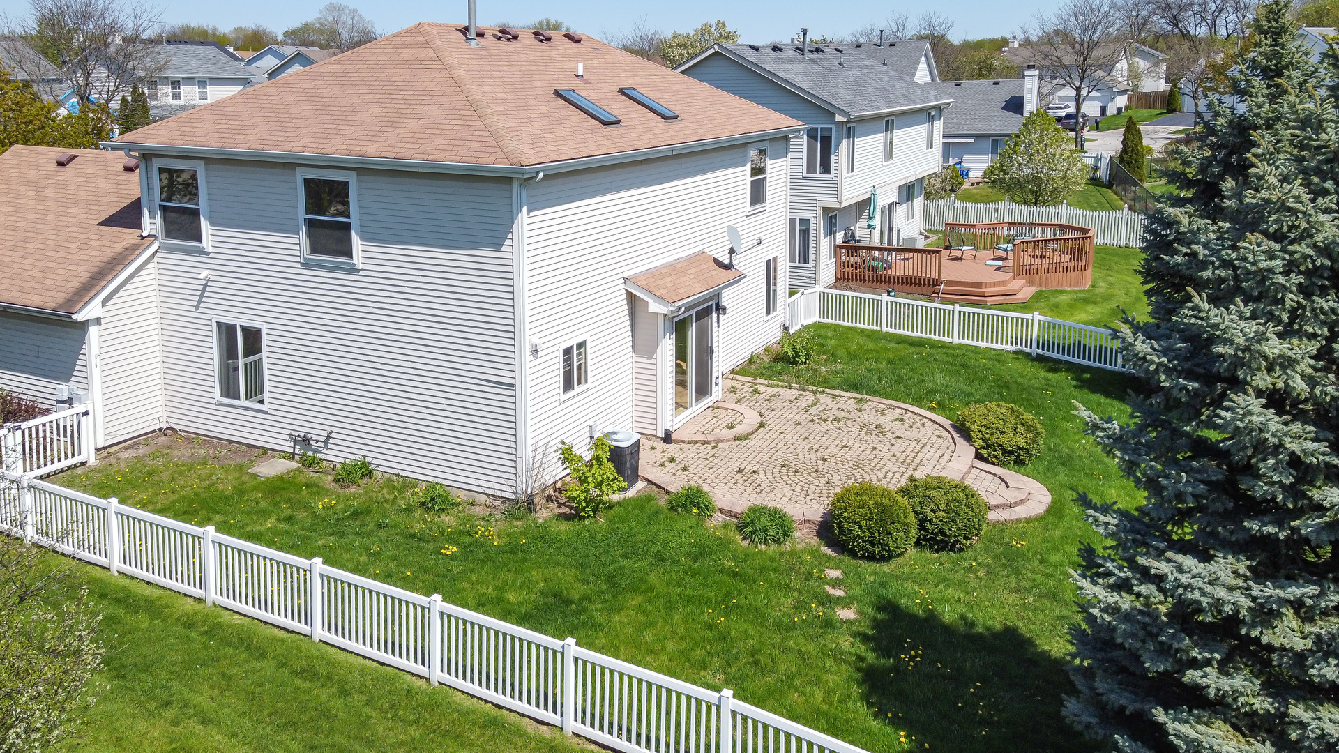 643 Maple Drive Streamwood, IL 60107 - Photo 25 of 32 a aerial view of a house with a yard and potted plants