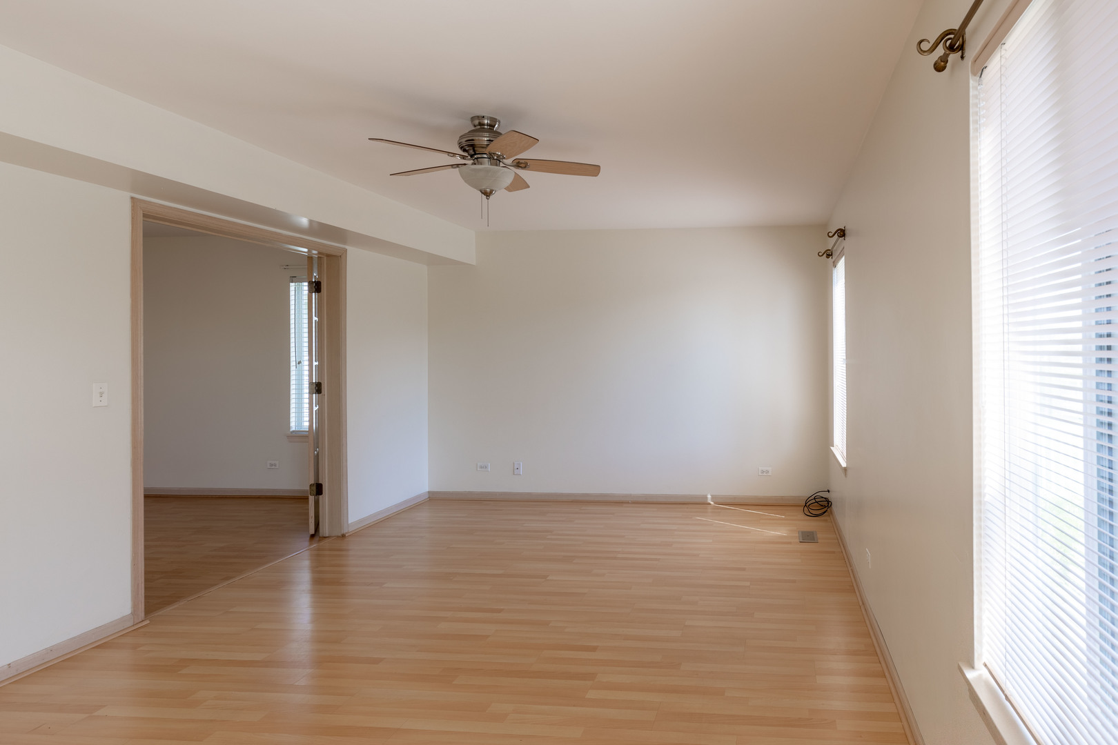 643 Maple Drive Streamwood, IL 60107 - Photo 10 of 32 wooden floor in an empty room with a window