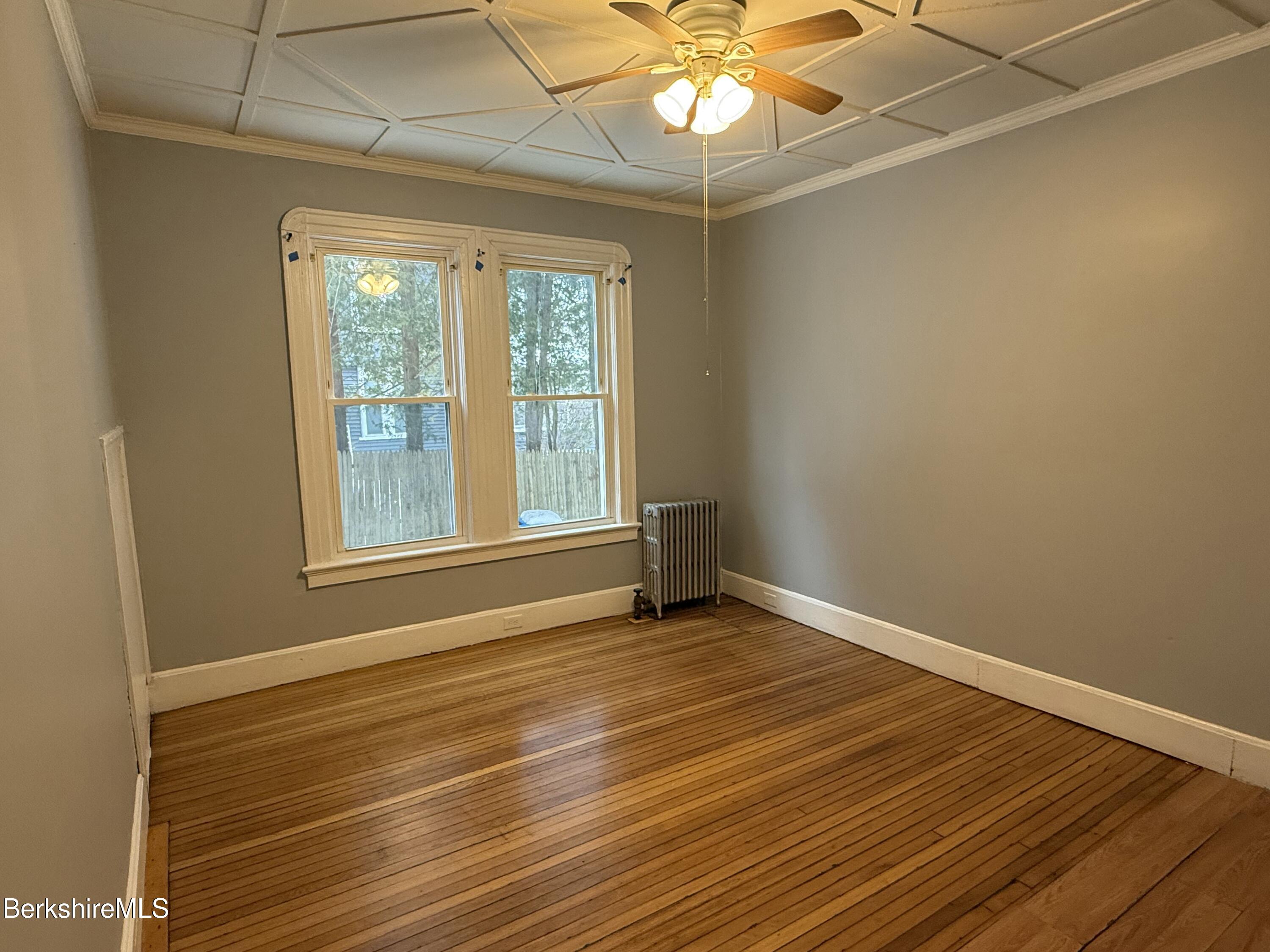 124 Appleton Avenue, Unit 1 Pittsfield, MA 01201 - Photo 1 of 10 a view of an empty room with a window