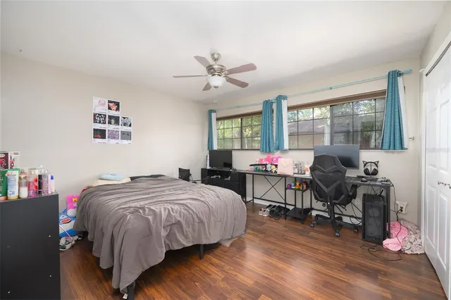 a bed room with a bed and furniture