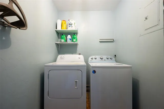 a utility room with dryer and washer