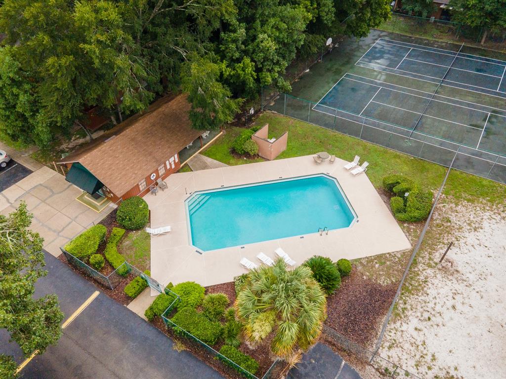 900 Southwest 62nd Boulevard, Unit H49 Gainesville, FL 32607 - Photo 35 of 38 an aerial view of a house