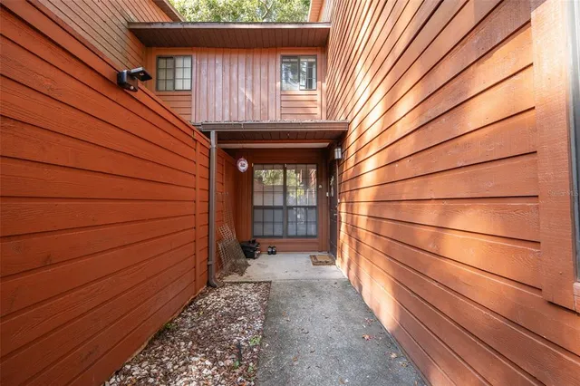 a view of house with wooden floor and a window