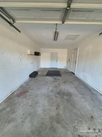 a view of a refrigerator in a room