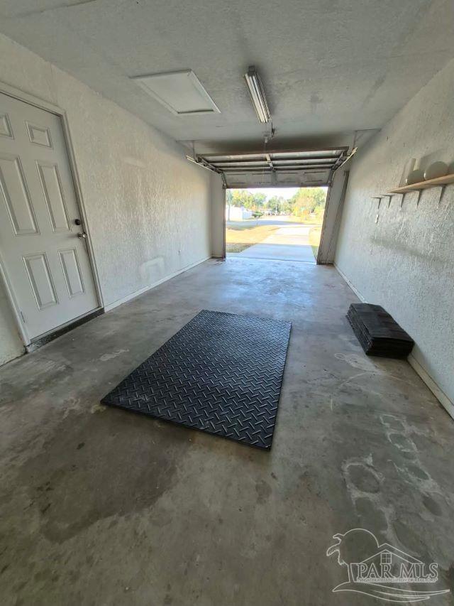 4071 Diamond Street Pace, FL 32571 - Photo 7 of 19 a view of an empty room and a window