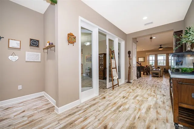 a view of livingroom with furniture and floor to ceiling window