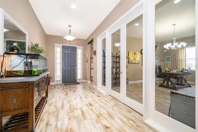 a view of a living room and bathroom
