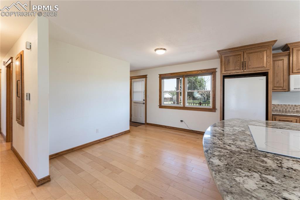 1075 8th Street Calhan, CO 80808 - Photo 38 of 45 a view of a livingroom with furniture and a window