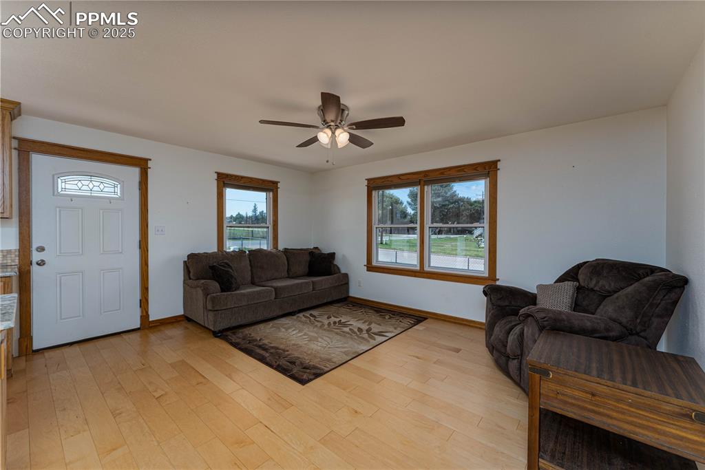 1075 8th Street Calhan, CO 80808 - Photo 4 of 45 a living room with furniture and a window