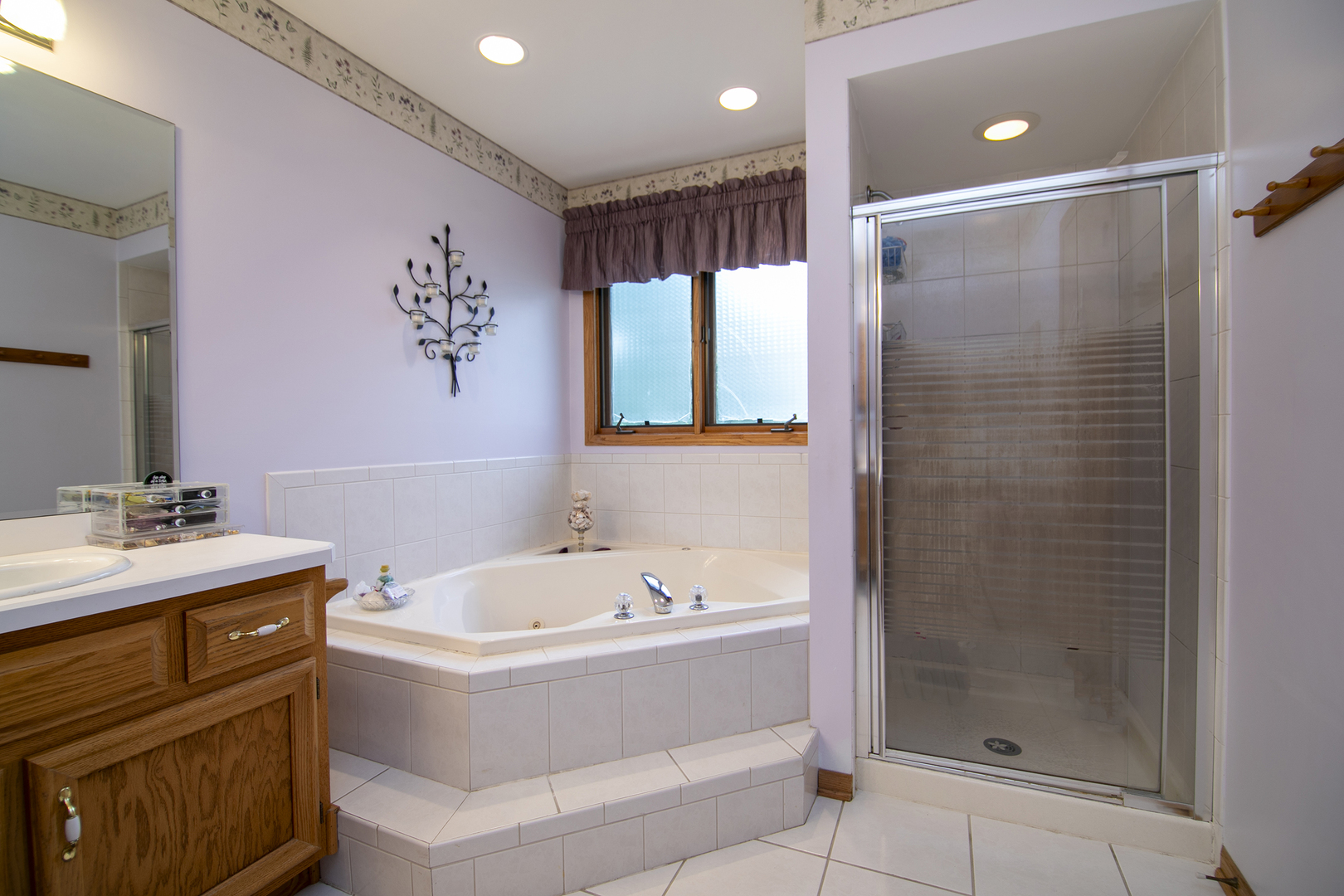 641 Lisson Grove New Lenox, IL 60451 - Photo 21 of 24 a bathroom with a bathtub and a sink