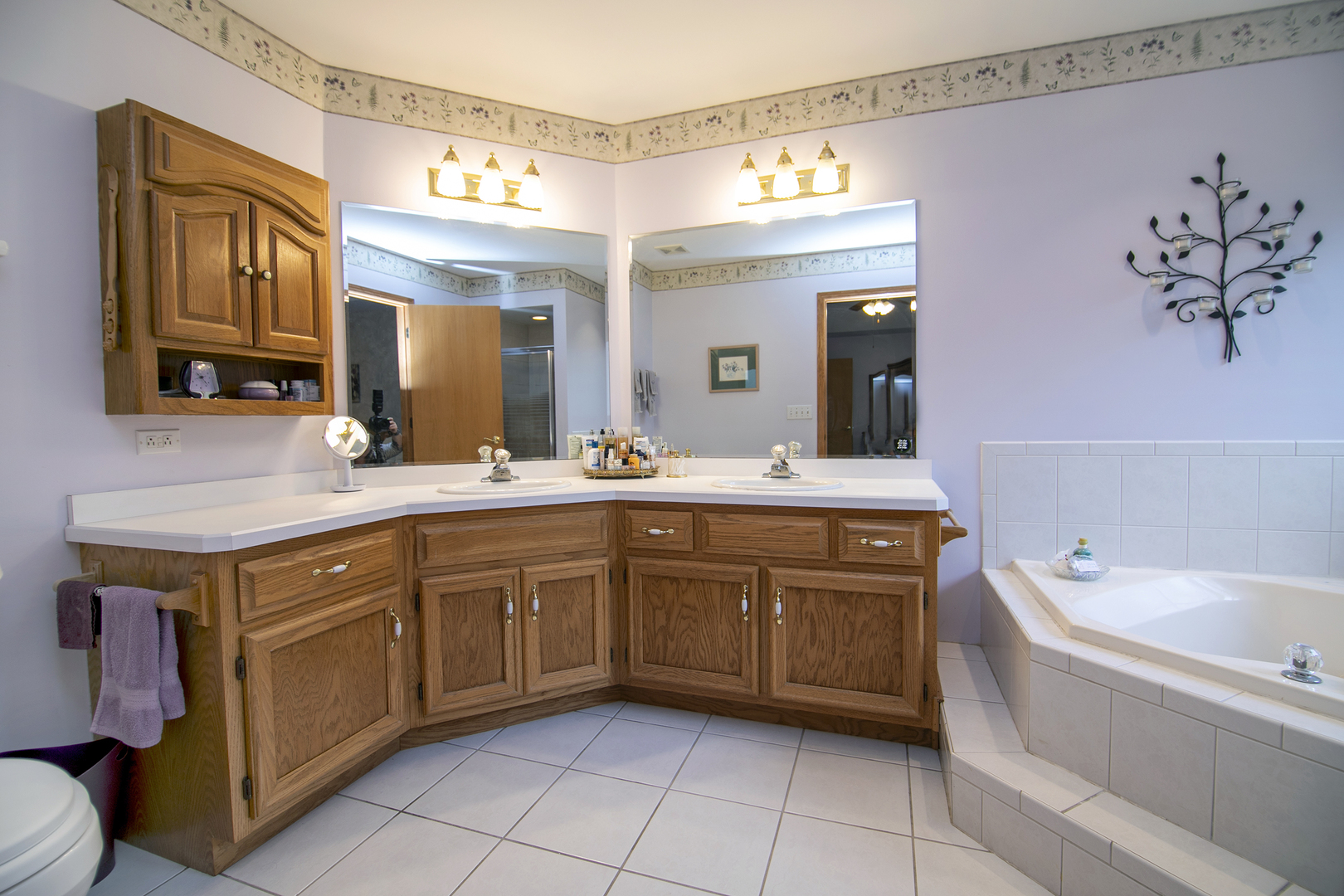 641 Lisson Grove New Lenox, IL 60451 - Photo 22 of 24 a bathroom with a granite countertop sink mirror and bathtub