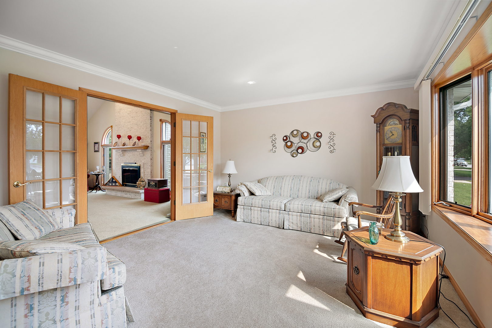 641 Lisson Grove New Lenox, IL 60451 - Photo 5 of 24 a living room with furniture and a large window