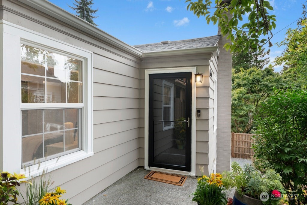 4431 Southwest Kenyon Place Seattle, WA 98136 - Photo 17 of 30 a view of entrance gate of a house