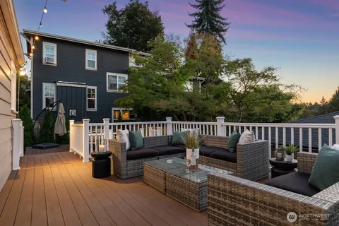 a view of a deck with furniture