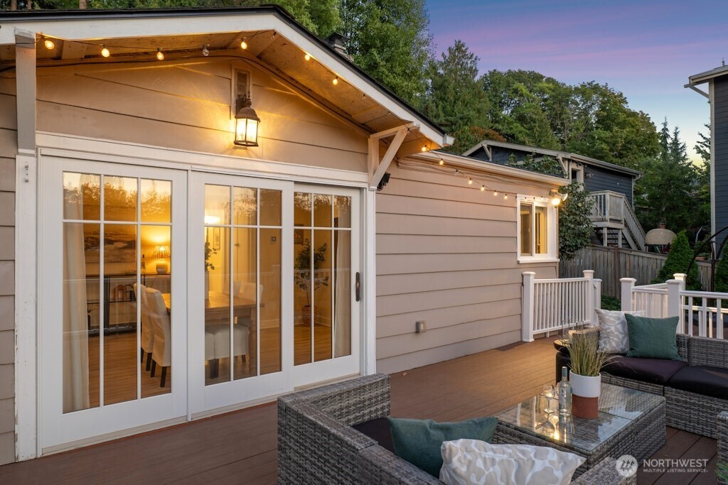 4431 Southwest Kenyon Place Seattle, WA 98136 - Photo 23 of 30 front view of a house with a glass door