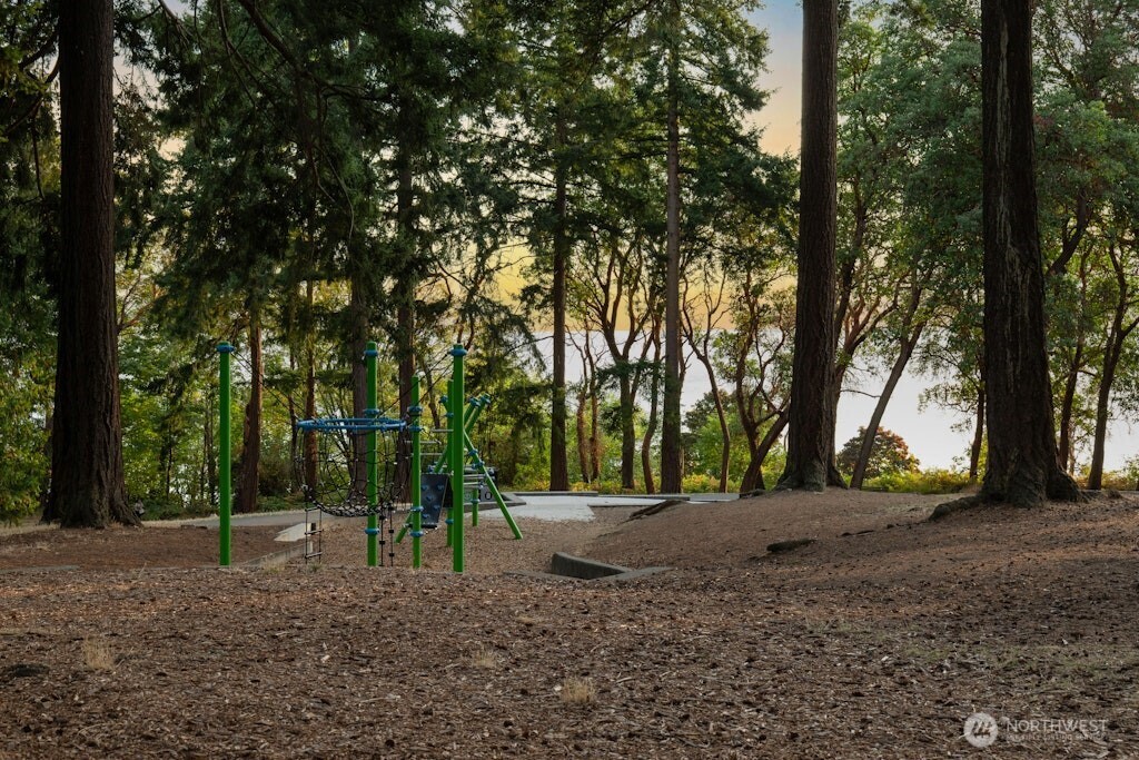 4431 Southwest Kenyon Place Seattle, WA 98136 - Photo 27 of 30 a view of road with trees